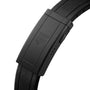 Close-up of a black clasp with a geometric logo on a textured leather strap, showcasing an elegant detail from the TAG Heuer Aquaracer Professional 200.