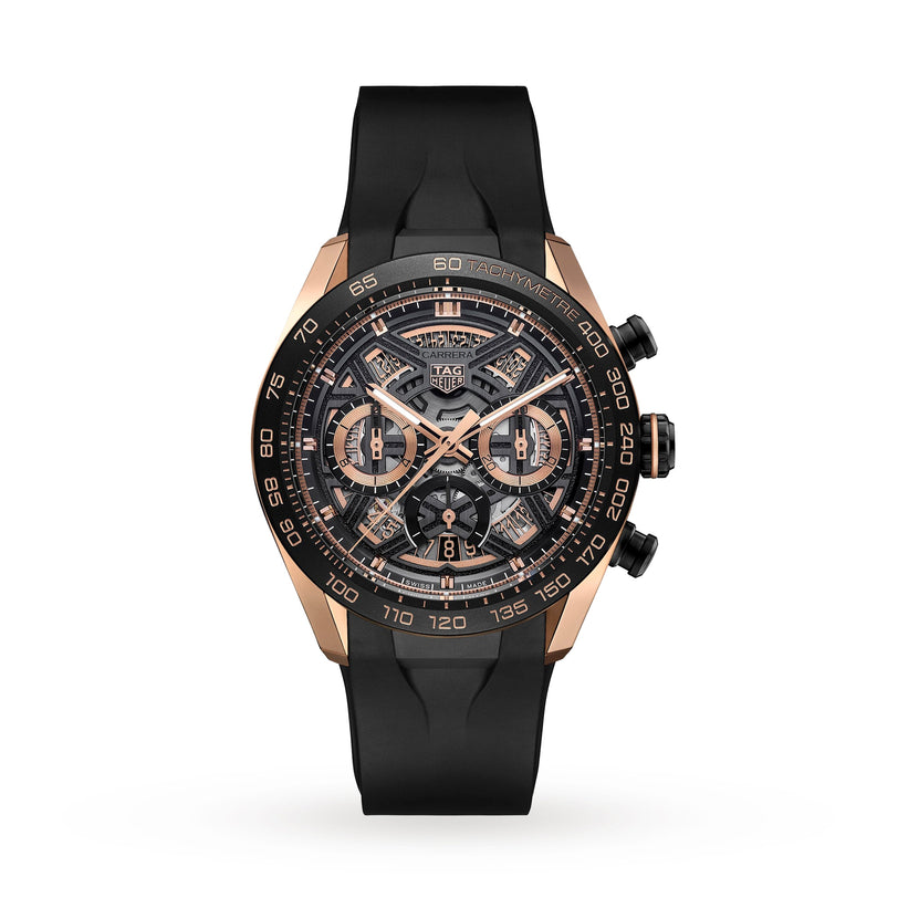 The TAG Heuer Carrera Chronograph Extreme Sport watch features a black rubber strap, rose gold accents, a skeleton dial with three subdials, and chronograph and tachymeter functions inspired by motorsport.