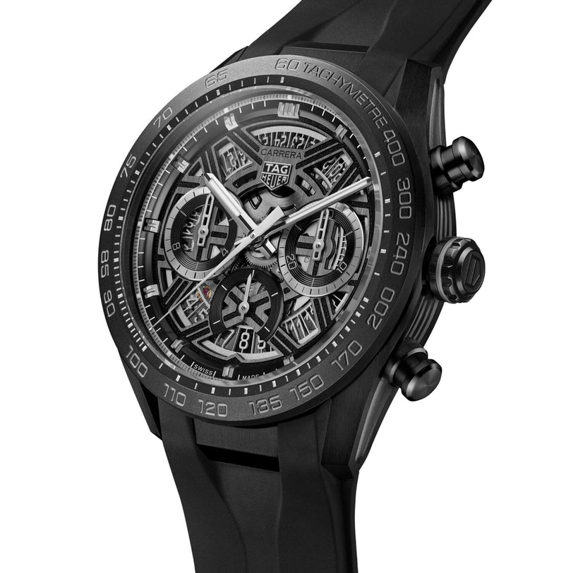 Close-up of the TAG Heuer Carrera Chronograph Extreme Sport watch, showcasing a bold skeleton design, tachymeter bezel, and black rubber strap.