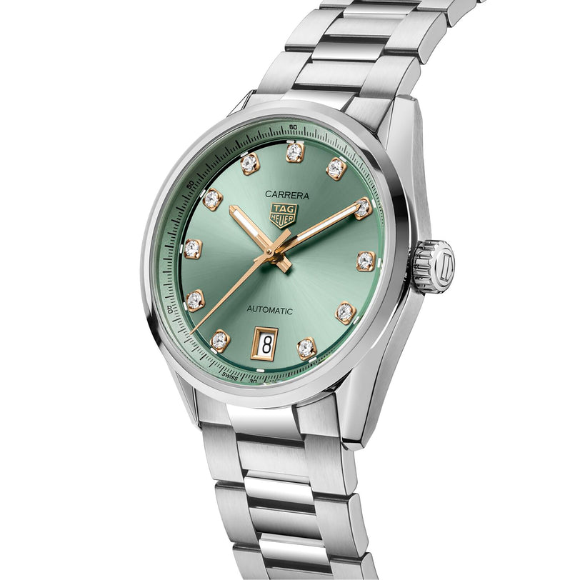 The TAG Heuer Carrera Date is a stainless steel watch featuring a green sunray-brushed dial, diamond hour markers, date display at 6 o’clock, and automatic movement.