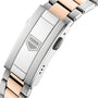Close-up of a TAG Heuer Aquaracer Professional 200 Solargraph clasp, showcasing its two-tone silver and rose gold links with an embossed geometric logo.