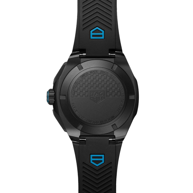 Back view of the TAG Heuer Formula 1 Chronograph, showcasing a black case, rubber strap, blue accents, tachymeter bezel, and engraved case back details.