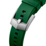 Close-up of a green TAG Heuer Formula 1 Solargraph watch strap with a silver buckle engraved with the TAG Heuer shield logo.