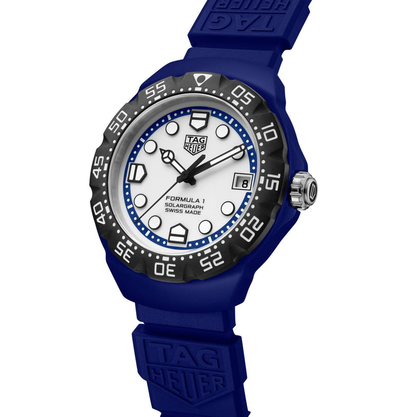 Blue TAG Heuer Formula 1 Solargraph watch with a white dial, black bezel, and blue rubber strap.