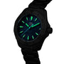 TAG Heuer Aquaracer Professional 200 Solargraph wristwatch featuring glowing green hour markers and hands on a dark blue dial, shown at an angle.