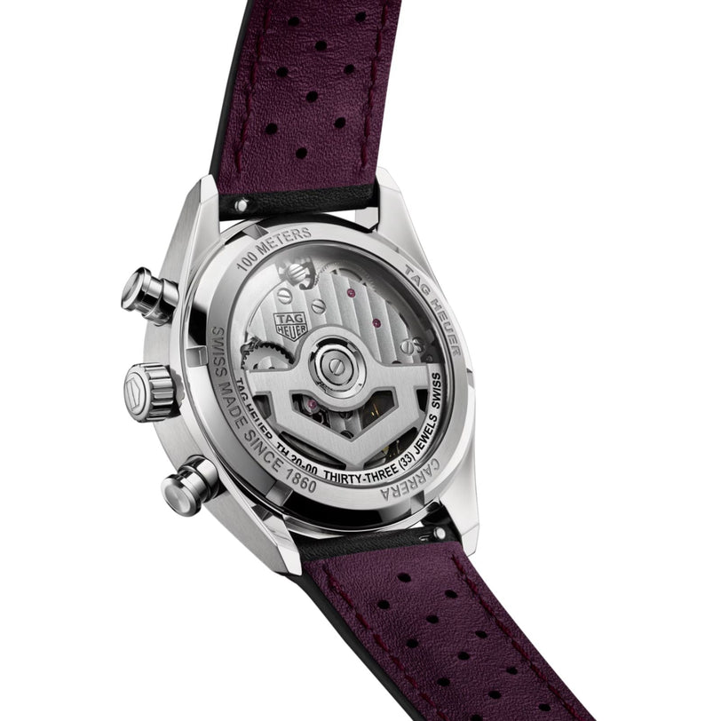 Back view of the TAG Heuer Carrera Chronograph, featuring its automatic movement visible through a transparent caseback and paired with a burgundy perforated leather strap.