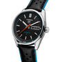 The TAG Heuer Carrera Day-Date wristwatch features a black leather strap, silver bezel, and displays both the date and day.
