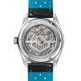 Close-up of the TAG Heuer Carrera Day Date watch’s transparent case back, revealing its intricate mechanical movement.