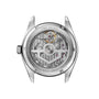 The back of a TAG Heuer Carrera Day-Date watch showcasing its exposed mechanical movement and engraved details.