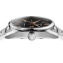 A close-up side view of the TAG Heuer Carrera Day-Date wristwatch in silver, featuring a black face and rose gold details.