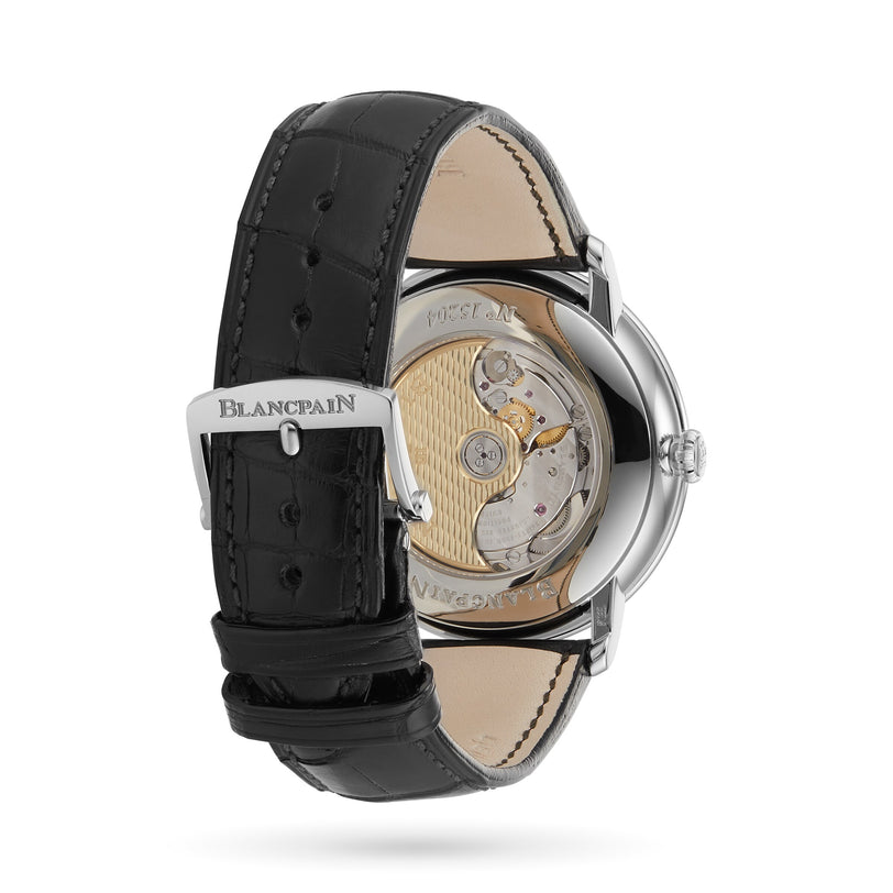Blancpain Villeret Quantième Complet watch with black leather strap features intricate mechanics visible through its transparent case back.