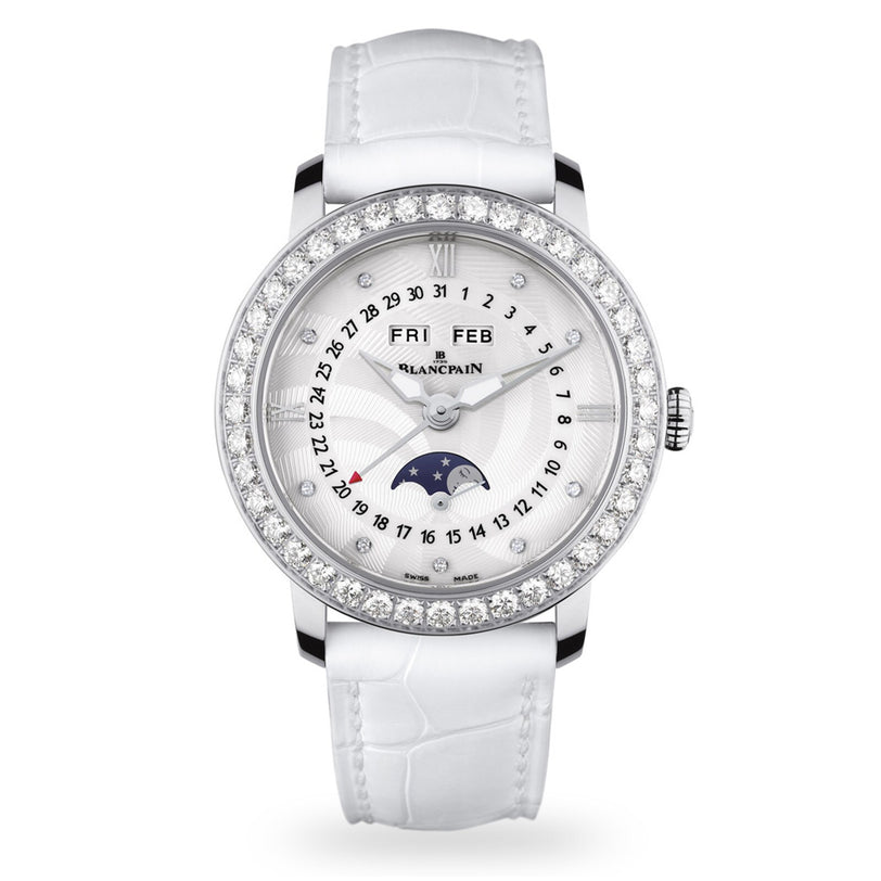 A Blancpain Villeret Quantième Complet wristwatch featuring a stainless steel case, diamond bezel, white strap, and silver dial with moonphase plus day, date, and month indicators.