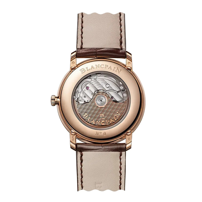 The image shows the back view of a Blancpain Villeret Quantième Complet wristwatch with a visible mechanical movement and a brown leather strap.