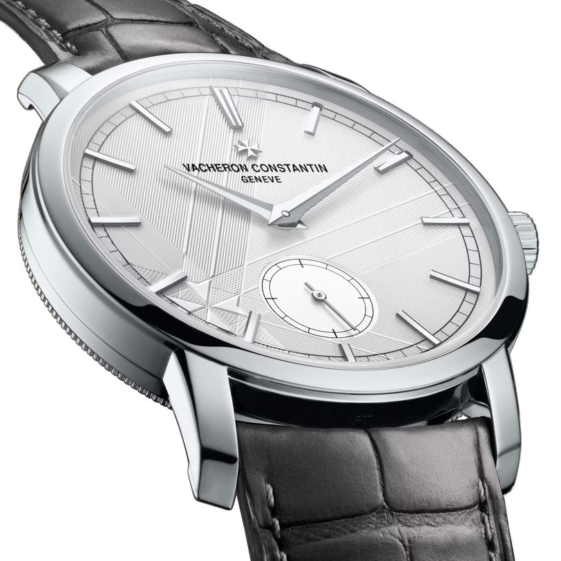 The Vacheron Constantin Traditionnelle Manual-Winding features a textured dial, silver hour markers, small seconds subdial, and a black leather strap—a timeless limited edition for discerning collectors.