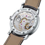 The image displays the back of the Vacheron Constantin Traditionnelle Manual-Winding watch, highlighting its mechanical movement, engraved details, and a leather strap.