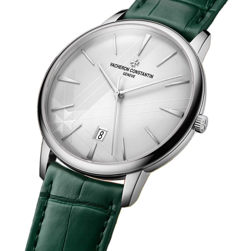 The limited edition Vacheron Constantin Patrimony Self-Winding features an 18K white gold case, white dial, date at 6 o’clock, Geneva Seal certification, and a bold green leather strap.