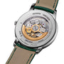 The caseback of the Vacheron Constantin Patrimony Self-Winding showcases its intricate mechanical movement, engraved details, and a green-accented leather strap.