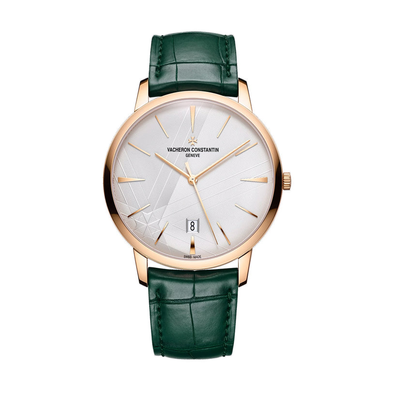 The Vacheron Constantin Patrimony Self-Winding is a limited edition wristwatch in 18K pink gold, featuring a silver dial with date at 6 o’clock, green leather strap, geometric patterns, Geneva Seal, and Vacheron Constantin branding.