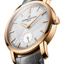 The Vacheron Constantin Traditionnelle Manual-winding is a limited edition 18K pink gold wristwatch with a silver geometric-patterned dial, gold hour markers, and a black leather strap.