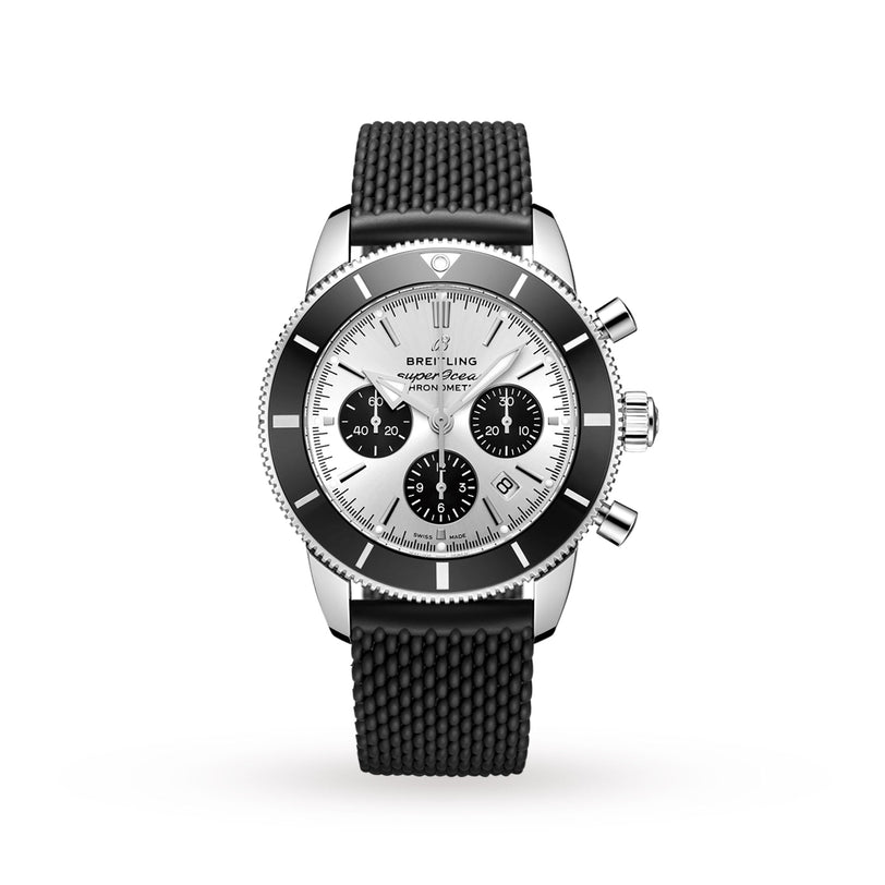 The Breitling Superocean Heritage B01 Chronograph 44 features a silver dial with three black subdials, a black rubber strap, water-resistant design, and is shown against a white background.