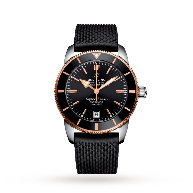 The Breitling Superocean Heritage B20 Automatic 42 features a black dial, rose gold bezel, date display, water resistance, and a black textured strap.