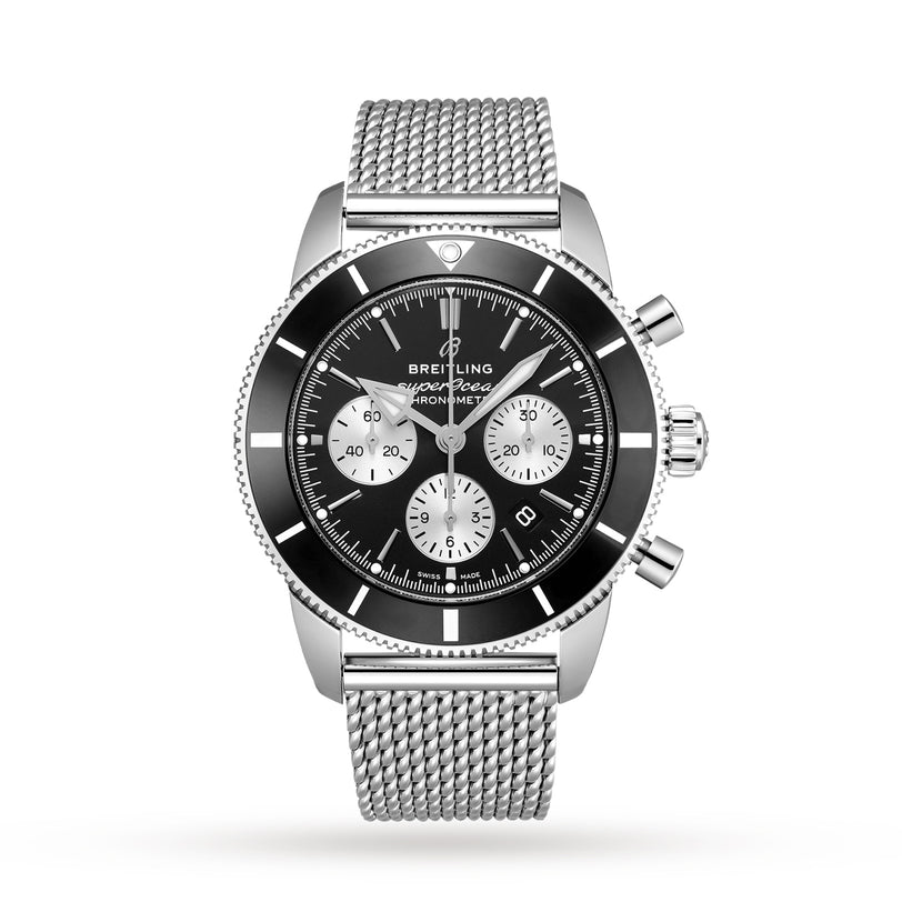 A Breitling Superocean Heritage B01 Chronograph 44 in stainless steel, featuring a black dial with three subdials and a mesh bracelet, is displayed against a white background.