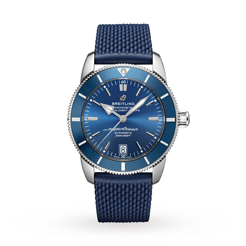 The Breitling Superocean Heritage B20 Automatic 42 features a 42mm stainless steel case, textured blue strap, silver bezel, and date window at 6 o’clock, powered by the B20 calibre and shown on a white background.