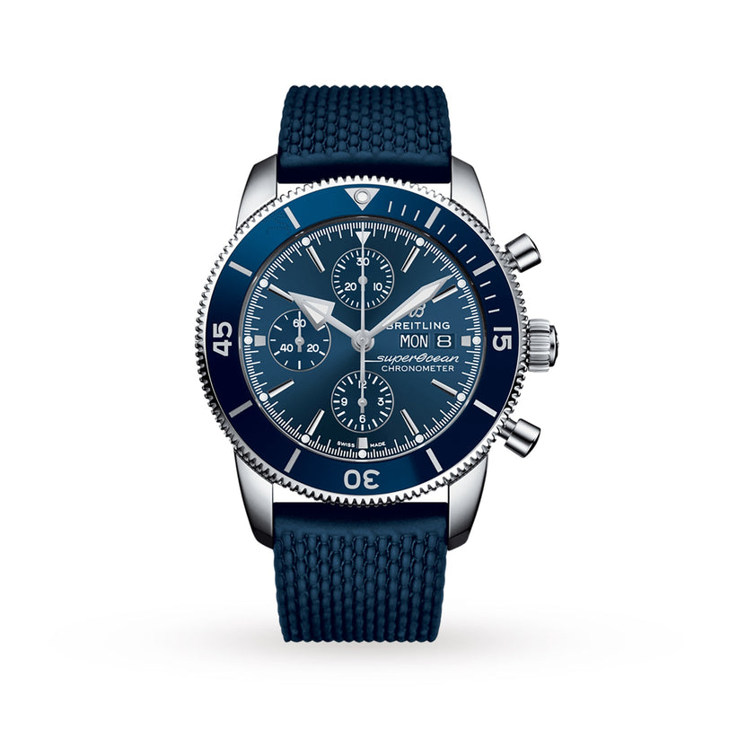 The Breitling Superocean Heritage Chronograph 44 is a blue sea watch with a textured strap, three subdials, silver hands, and Breitling 13 calibre movement, shown against a white background.