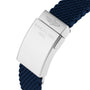 Close-up of a Breitling Superocean Heritage Chronograph 44 stainless steel clasp engraved with BREITLING 1884 and logo, attached to a blue textured rubber strap.