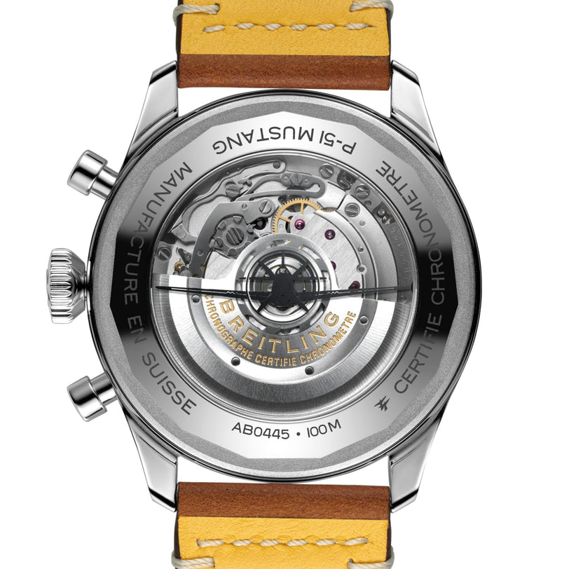 Back view of the Breitling Super AVI B04 Chronograph GMT 46 P-51 Mustang, showcasing its aviation-inspired design, exposed automatic movement through a sapphire caseback, leather strap, and engraved model and water resistance details.