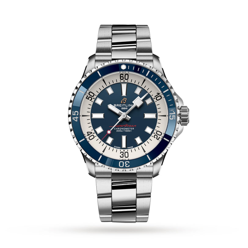 The Breitling Superocean Automatic 42 is a stainless steel dive watch with automatic movement, a blue dial with white accents, and a metal link bracelet, shown against a white background.