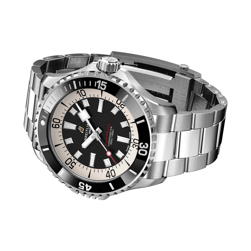 The Breitling Superocean Automatic 46 is a stainless steel watch inspired by the 1960s Slow Motion era, with a black and white rotating bezel, black dial, luminous hands and markers, date window, and metal link bracelet.