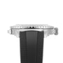 Side view of the Breitling Superocean Automatic 46, showing a silver case, ridged bezel, black textured strap, and powered by the reliable Breitling 17 calibre movement.
