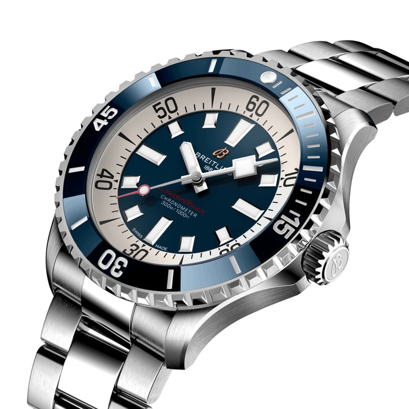 The Breitling Superocean Automatic 46 features a 46mm stainless steel case, blue and white bezel, blue dial with silver hour markers, and comes on a metal link bracelet.