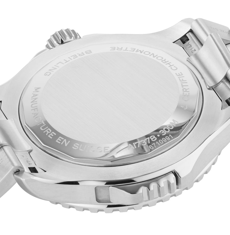 Close-up of the back of a Breitling Superocean Automatic 46, highlighting engraved text and serial number on the stainless steel, water-resistant case back.