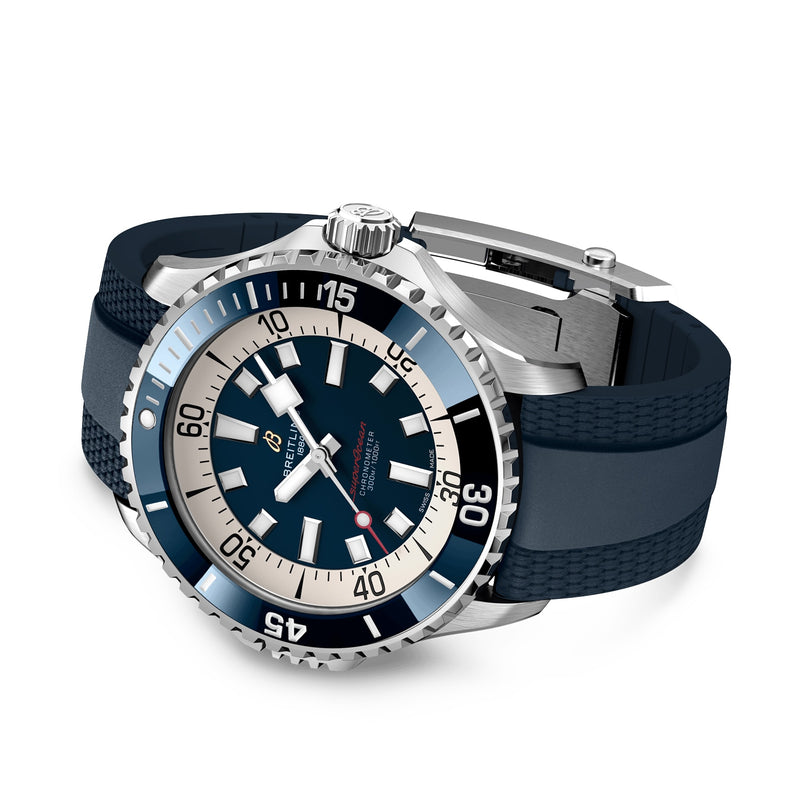Breitling Superocean Automatic 46: a silver dive watch with a blue and black dial, white hour markers, sapphire bezel, textured blue rubber strap, and robust Breitling 17 calibre movement.