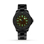 The Breitling Superocean Automatic 36 is a black dive watch with a metal band, illuminated green hour markers and hands on a dark face, water resistance, and reliable automatic movement.