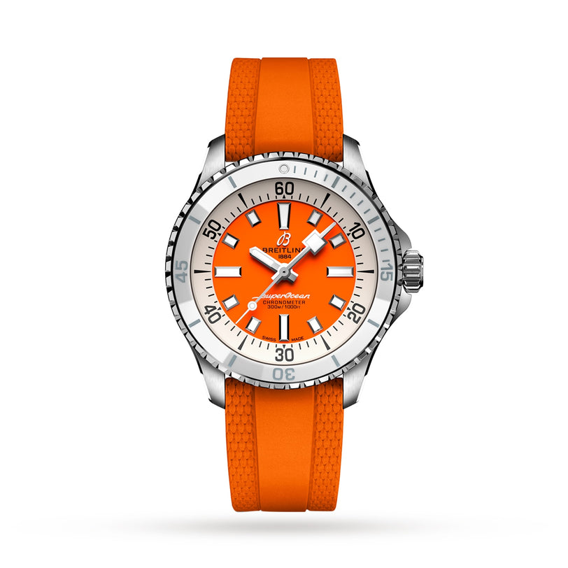 The Breitling Superocean Automatic 36 is a stainless steel dive watch with a tangerine rubber strap, orange dial, silver and white hour markers, and a rotating bezel.