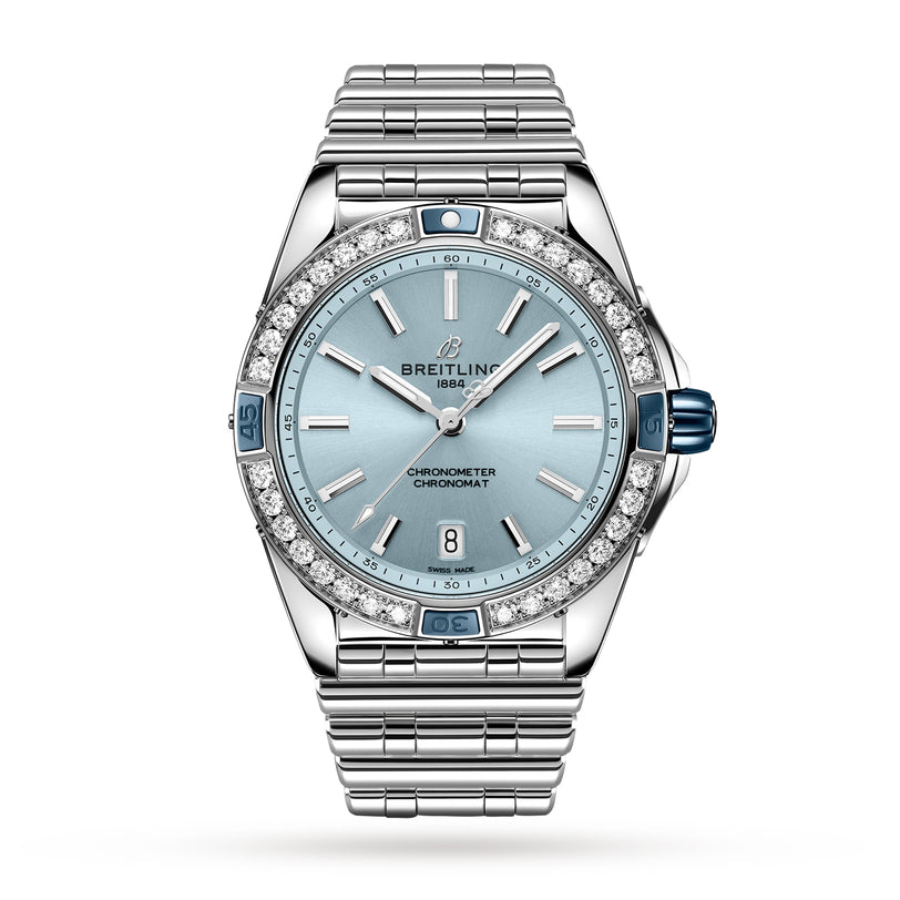 A Breitling Super Chronomat Automatic 38 wristwatch in silver with a blue dial, diamond bezel, date at 6 o’clock, and stainless steel bracelet, displayed on a white background.