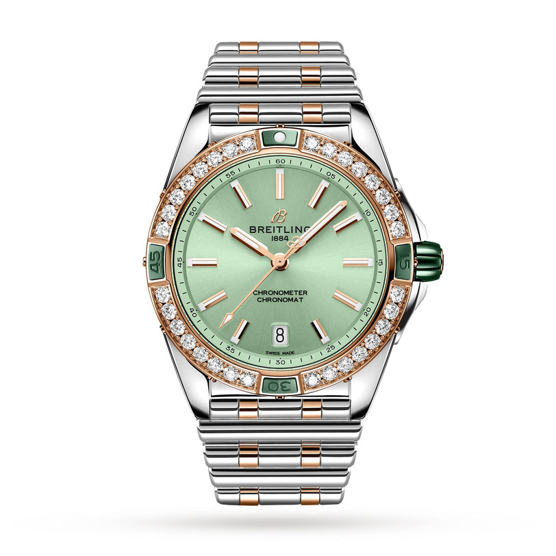 The Breitling Super Chronomat Automatic 38 features a mint green dial, diamond-set bezel, rose gold and stainless steel case, date at 6 o’clock, and a two-tone metal bracelet.