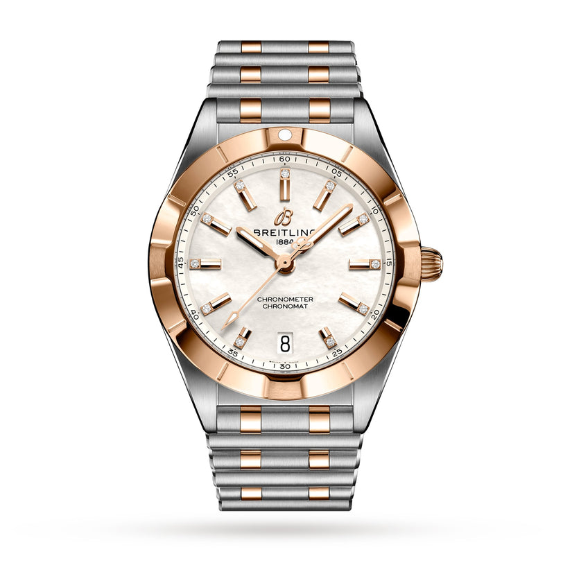 The Breitling Chronomat 32 features a silver and rose gold bracelet, white dial, gold hour markers, date display at 6 o’clock, and the Breitling logo under 12—showcasing the brand’s signature brilliance.