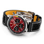 The Breitling Top Time B01 Chevrolet Corvette features a red dial, black subdials, black perforated leather strap, and silver case with the Manufacture Calibre 01, shown angled on a white background.