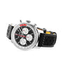The Breitling Top Time B01 Deus is a black and silver racing chronograph featuring a black perforated leather strap, three white subdials, a date window, and is powered by the Breitling Manufacture Calibre 01.