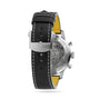 Close-up rear view of the Breitling Top Time B01 Triumph, highlighting its black leather strap with white stitching and the detailed Breitling 01 calibre movement visible through the transparent case back.
