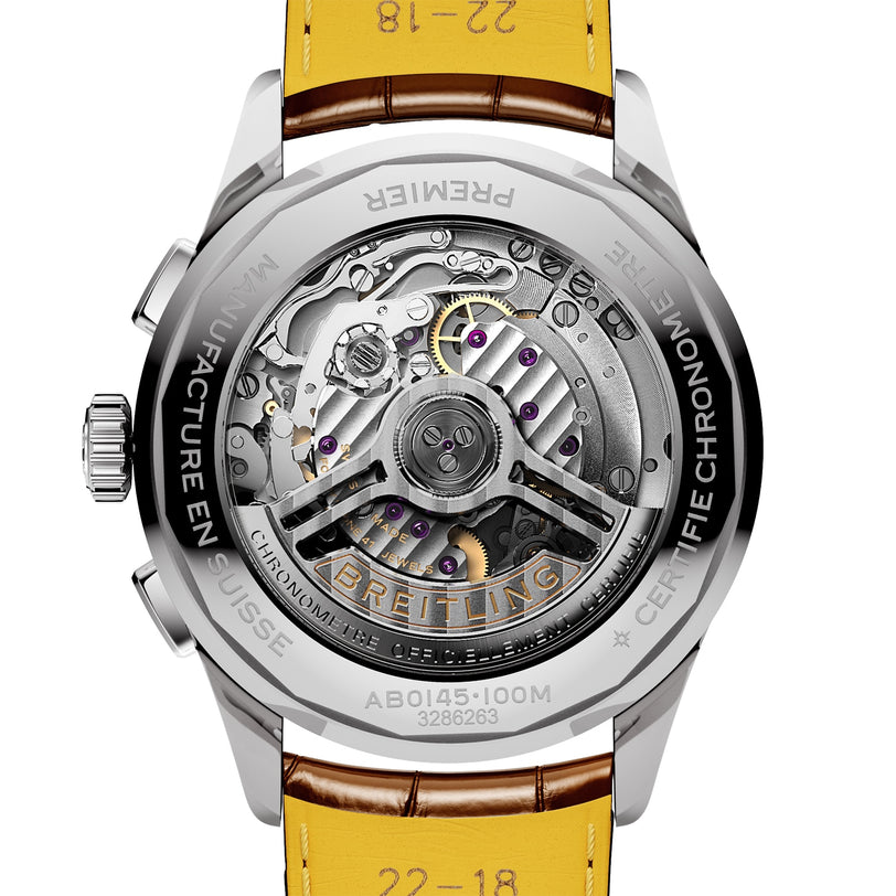 The back view of the Breitling Premier B01 Chronograph 42 reveals its exposed mechanical movement, engraved detailing, and yellow leather strap—showcasing COSC-certified chronograph precision.
