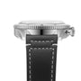 Side view of the Breitling Classic AVI Chronograph 42 Tribute To Vought F4U, showcasing a round silver case, knurled bezel, crown, and black leather strap with white stitching. Powered by the precise Breitling 23 calibre.