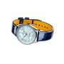 The Breitling Navitimer 32 features a blue leather strap, silver case, and blue mother of pearl dial with diamond hour markers, shown on a white background.