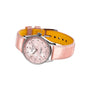 The Breitling Navitimer 32 wristwatch features a pink mother-of-pearl dial, diamond hour markers, and a pink leather strap, powered by the Breitling 77 calibre, shown on a white background.