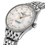 The Breitling Navitimer 32 features a silver case, mother-of-pearl dial with diamond hour markers, gold hands, link bracelet, and is powered by the precise Breitling Calibre 77 SuperQuartz™ movement.