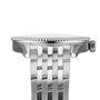 Close-up side view of the Breitling Navitimer 32, a silver wristwatch with a metal link band, ridged bezel and crown on the right, powered by the precise Breitling Calibre 77 SuperQuartz™ movement.